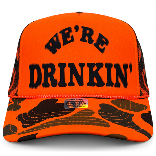 We're Drinkin' Camo Trucker Hat